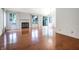 Bright living room with hardwood floors, fireplace, and sliding glass door at 4462 Carya Sq, Columbus, IN 47201