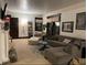 Cozy living room with ample seating, neutral decor, and natural light at 48 N Audubon Rd, Indianapolis, IN 46219