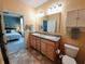 The double vanity bathroom provides convenience and style, with easy access to the bedroom at 4817 Allium Dr, Plainfield, IN 46168