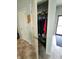 Entry closet with hanging clothes and shoe storage, optimizing space and organization at 4817 Allium Dr, Plainfield, IN 46168