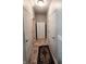 Hallway featuring a patterned rug, recessed lighting and multiple doors at 4817 Allium Dr, Plainfield, IN 46168