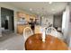 Spacious kitchen with an island bar, stainless appliances, and seamless flow to the dining area at 4817 Allium Dr, Plainfield, IN 46168