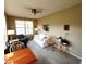 The cozy living room features a ceiling fan, comfortable seating, and lots of natural light at 4817 Allium Dr, Plainfield, IN 46168