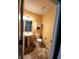 Practical powder room featuring a pedestal sink, toilet, and cabinet at 4817 Allium Dr, Plainfield, IN 46168