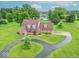 An attractive single-Gathering home on a large, lush green lot with mature trees at 505 Jones Pl, Martinsville, IN 46151