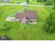 Spacious residential property with a sprawling lawn, mature trees, and a private driveway at 505 Jones Pl, Martinsville, IN 46151