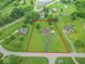 This lovely home sits on a large lot with a long, winding driveway. The lot is outlined in red at 505 Jones Pl, Martinsville, IN 46151