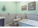 Stylish bathroom featuring a standalone tub, modern fixtures, and elegant decor at 505 Jones Pl, Martinsville, IN 46151