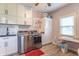 Well-equipped laundry room with modern appliances, ample storage, and a functional workspace at 505 Jones Pl, Martinsville, IN 46151
