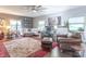 Spacious living room with a large sectional, leather recliners, and lots of natural light at 505 Jones Pl, Martinsville, IN 46151