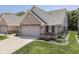 Charming single-Gathering home with a two-car garage, brick accents, and well-maintained landscaping at 5351 Abbington Ave, Plainfield, IN 46168