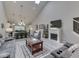 Spacious living room with vaulted ceilings, a fireplace, recessed lighting, and open concept at 5351 Abbington Ave, Plainfield, IN 46168