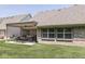 Charming outdoor patio with a pergola, fan, seating area, grill, and well-maintained lawn at 5351 Abbington Ave, Plainfield, IN 46168