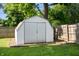 Storage shed in backyard providing space to keep your tools and toys, and equipment at 5625 Winston Dr, Indianapolis, IN 46226