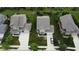 Aerial view of the residence, neighboring homes, and well-maintained landscaping at 5684 Autumn Trl, Brownsburg, IN 46112