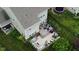 Lovely backyard shows off the patio area complete with a fire pit, BBQ, table, and lounge area for entertaining and relaxation at 5684 Autumn Trl, Brownsburg, IN 46112