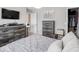 This bedroom has plush carpet, a dresser, and a closet for extra storage space at 5684 Autumn Trl, Brownsburg, IN 46112