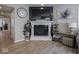 Elegant fireplace with a decorative mantel, perfect for cozy evenings at 5684 Autumn Trl, Brownsburg, IN 46112