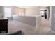 Upstairs hallway overlooking living area at 5684 Autumn Trl, Brownsburg, IN 46112