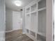 Hallway boasts built-in shelving and a seating area at 5684 Autumn Trl, Brownsburg, IN 46112
