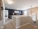 Upstairs hallway showcasing dark accent walls and multiple seating areas at 5684 Autumn Trl, Brownsburg, IN 46112