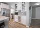 Kitchen pantry offers wine storage and built-in bench seating at 5684 Autumn Trl, Brownsburg, IN 46112