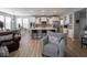 Well-lit kitchen featuring modern appliances, a central island, and stylish finishes at 5684 Autumn Trl, Brownsburg, IN 46112