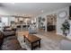Open-concept living space featuring a modern kitchen and comfortable living area at 5684 Autumn Trl, Brownsburg, IN 46112