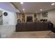 Cozy living room with a comfortable sectional, a TV, and lots of decor at 5684 Autumn Trl, Brownsburg, IN 46112