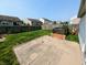 Private backyard showing a grassy area, fence, and patio, great for entertaining and relaxing at 581 Grassy Bend Dr, Greenwood, IN 46143
