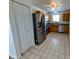 Modern kitchen featuring stainless steel appliances, ample storage, and neutral-toned flooring at 581 Grassy Bend Dr, Greenwood, IN 46143