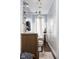Traditional bathroom with wainscoting and a vintage-style clawfoot tub at 6280 Washington Blvd, Indianapolis, IN 46220