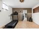 A home gym space with a treadmill, mirror, and weight rack, perfect for fitness enthusiasts at 6280 Washington Blvd, Indianapolis, IN 46220