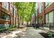 Building courtyard with greenery, benches, and tables at 630 N College Ave # 409, Indianapolis, IN 46204