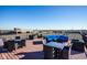 Rooftop deck and patio furniture overlooking the city at 630 N College Ave # 409, Indianapolis, IN 46204
