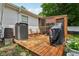 Back deck with outdoor seating and grill, plus yard view at 6691 N Baltimore Rd, Monrovia, IN 46157