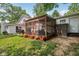 Exterior view of home with enclosed patio, wood deck and spacious backyard at 6691 N Baltimore Rd, Monrovia, IN 46157