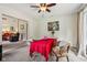 Dining room with red tablecloth and ceiling fan at 6691 N Baltimore Rd, Monrovia, IN 46157