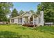 Charming home featuring a cozy front porch and well-maintained lawn at 6691 N Baltimore Rd, Monrovia, IN 46157