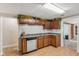 Kitchen with wood cabinets, countertops and stainless steel dishwasher at 6691 N Baltimore Rd, Monrovia, IN 46157