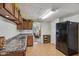 Functional kitchen with stainless steel sink and ample cabinet space at 6691 N Baltimore Rd, Monrovia, IN 46157