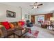 Spacious living room featuring cozy seating and neutral carpet at 6691 N Baltimore Rd, Monrovia, IN 46157