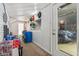 Bright mudroom showing interior access to garage featuring a vehicle at 6691 N Baltimore Rd, Monrovia, IN 46157