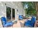 Comfortable seating on the patio creates a welcoming outdoor living space in the backyard at 6760 Navigate Way, Indianapolis, IN 46250