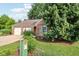 Charming single-story brick home featuring a two-car garage and well-maintained landscaping at 6760 Navigate Way, Indianapolis, IN 46250