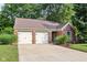 Charming single-story brick home featuring a two-car garage and well-maintained landscaping at 6760 Navigate Way, Indianapolis, IN 46250