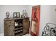 Dry bar area featuring wood cabinets, built-in wine rack and decor at 6940 Mockernut Ct, Plainfield, IN 46168