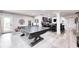 Basement area showcasing a ping pong table, and a wet bar with stools at 6940 Mockernut Ct, Plainfield, IN 46168