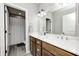 Bathroom features double sinks, wood cabinets and updated fixtures at 6940 Mockernut Ct, Plainfield, IN 46168