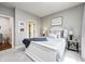 Bedroom featuring a bed with plush pillows and soft blanket at 6940 Mockernut Ct, Plainfield, IN 46168